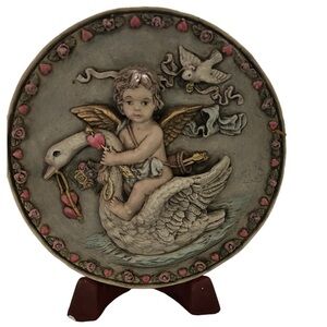 Ceramic plate 8” for wall hanging or use with table stand.